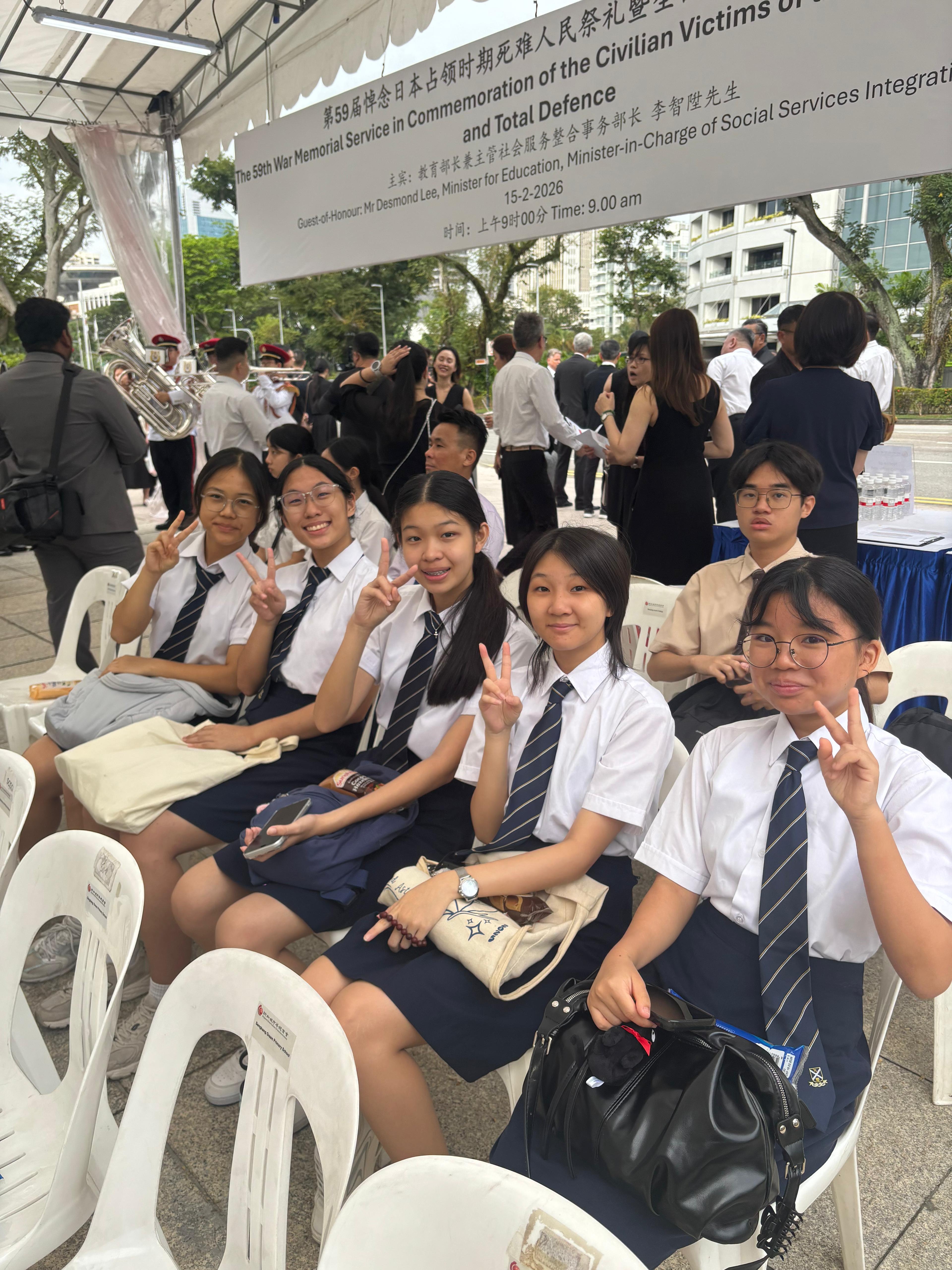 Students at total defence memorial event